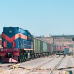 industrial cargo train with blue red loco at railw 2023 11 27 05 14 58 utc