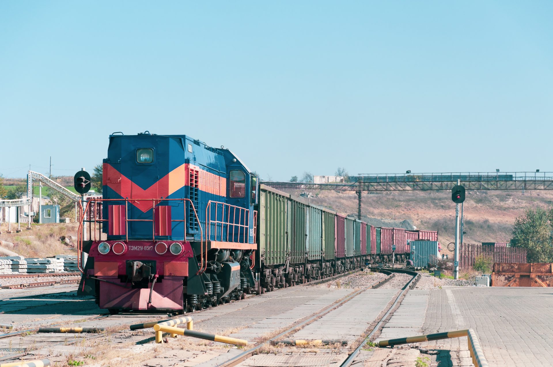 industrial cargo train with blue red loco at railw 2023 11 27 05 14 58 utc