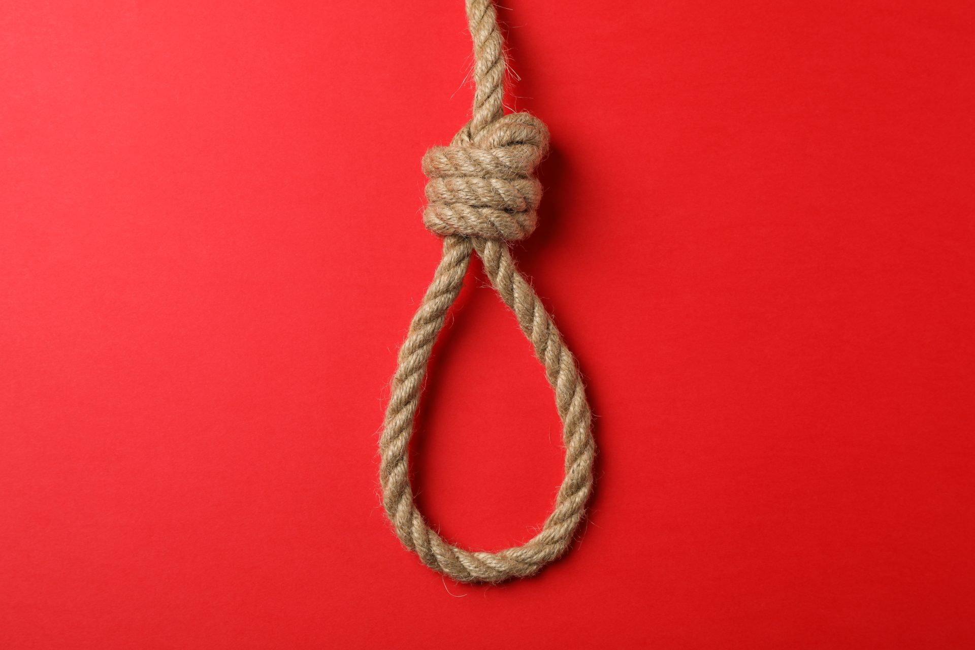 suicide rope on red background space for text 2023 11 27 05 32 33 utc