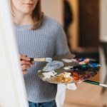 the palette of paints in the hands of the artist 2023 11 27 04 56 33 utc