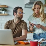 beautiful young couple going over financial bills 2023 11 27 05 12 57 utc