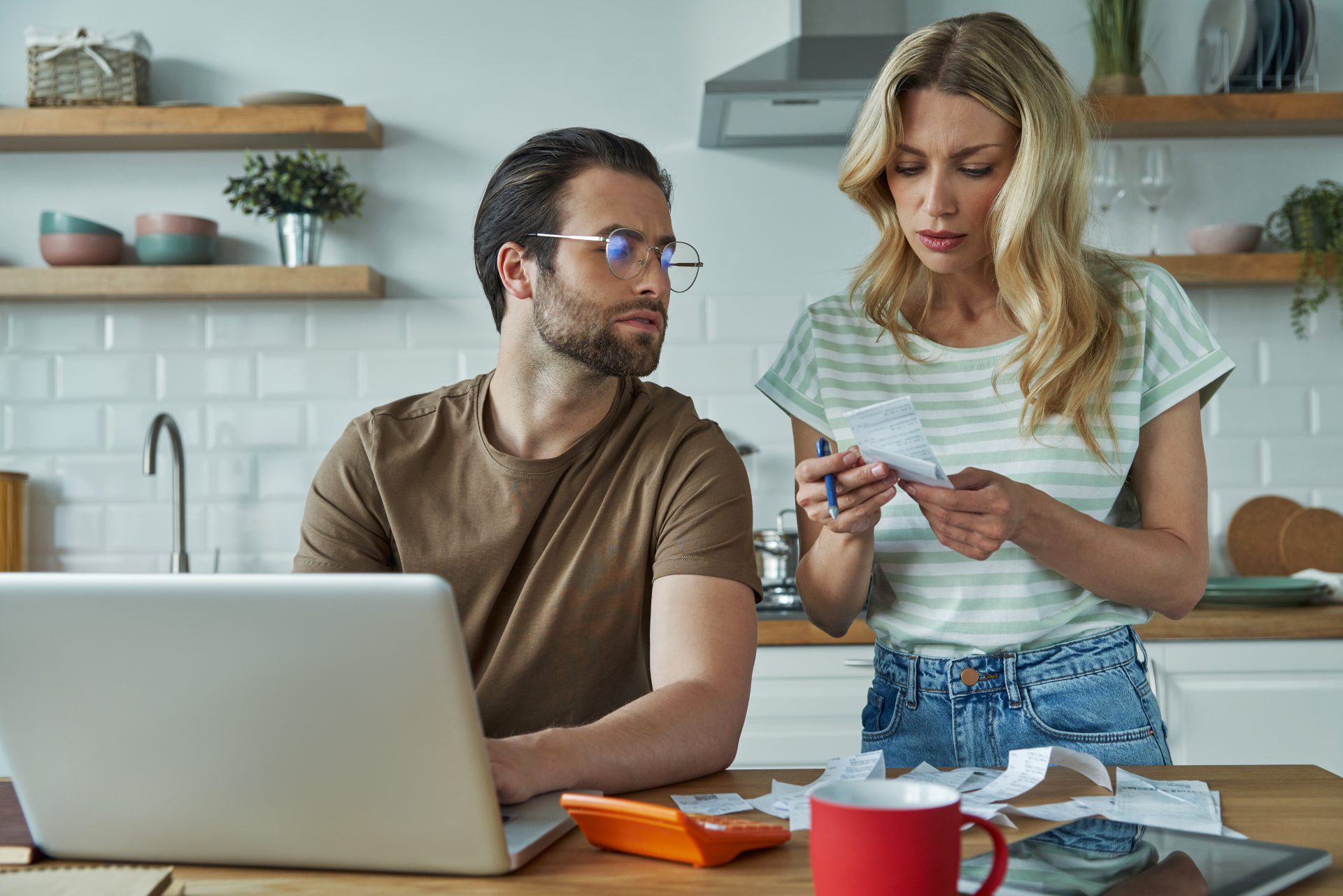 beautiful young couple going over financial bills 2023 11 27 05 12 57 utc