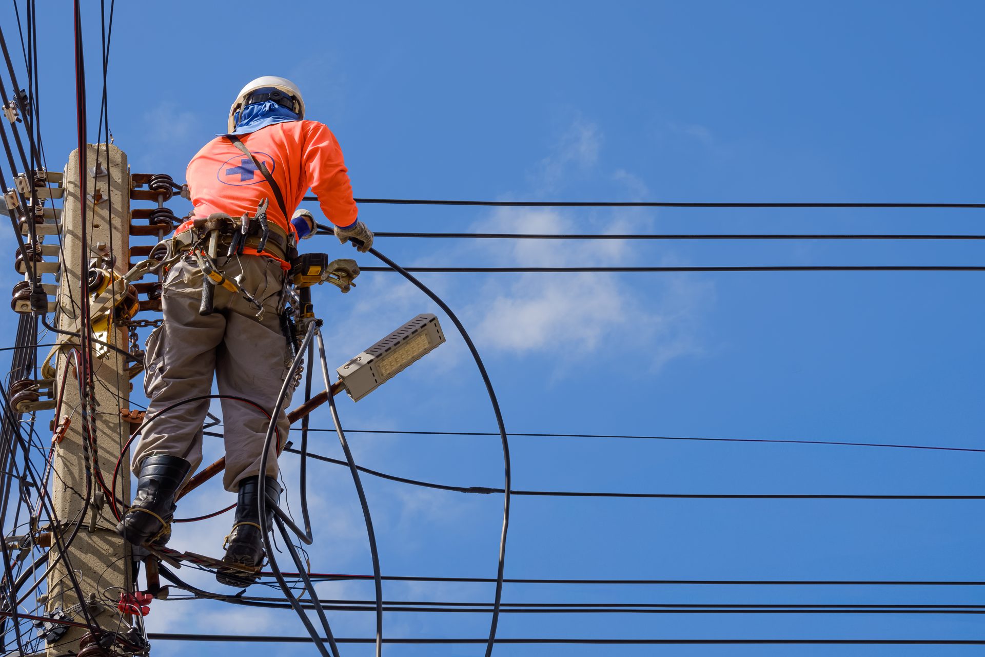 electrician is installing cable lines and electric 2024 02 07 12 45 59 utc