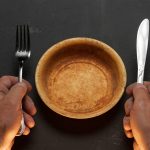 empty bowl on dark background with copy space 2023 11 27 05 09 14 utc