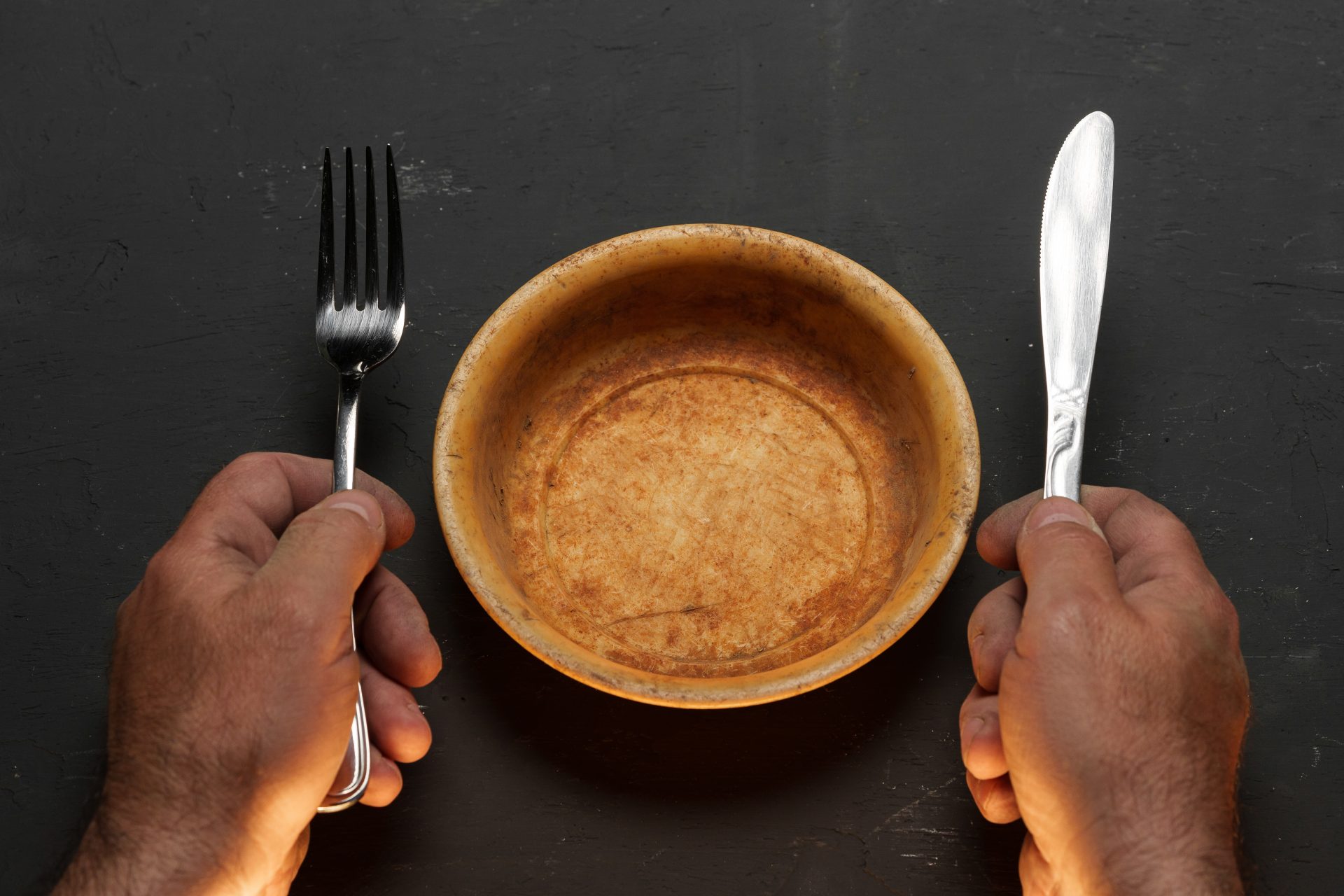 empty bowl on dark background with copy space 2023 11 27 05 09 14 utc