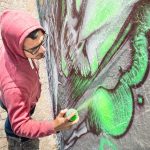 street artist painting colorful graffiti on generi 2023 11 27 05 37 02 utc