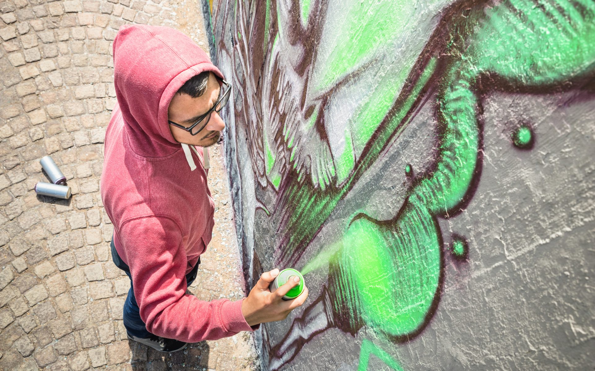 street artist painting colorful graffiti on generi 2023 11 27 05 37 02 utc