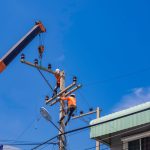 two electricians with crane truck are installing e 2023 11 27 04 53 45 utc