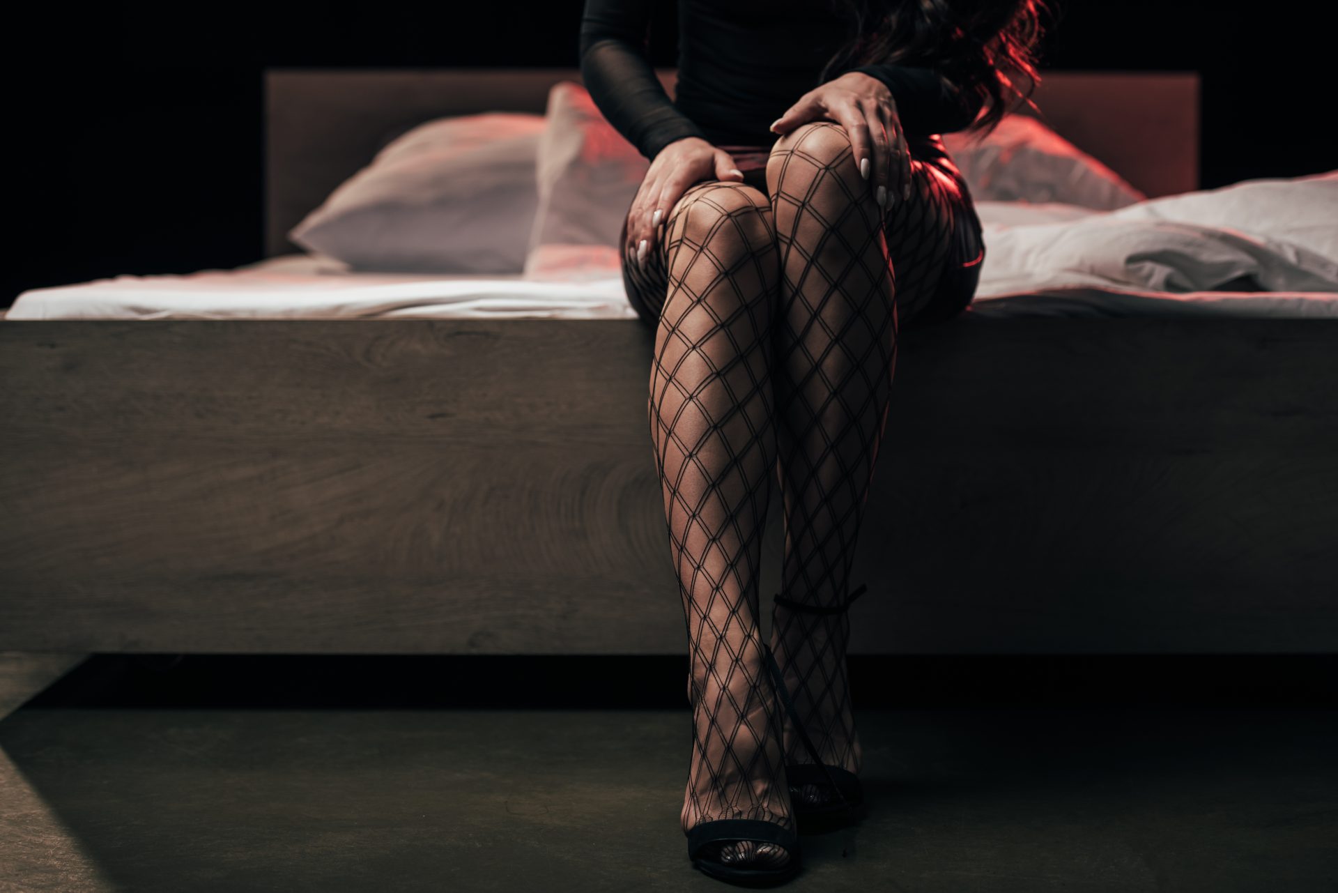 cropped view of prostitute in mesh stockings sitti 2023 11 27 05 25 21 utc