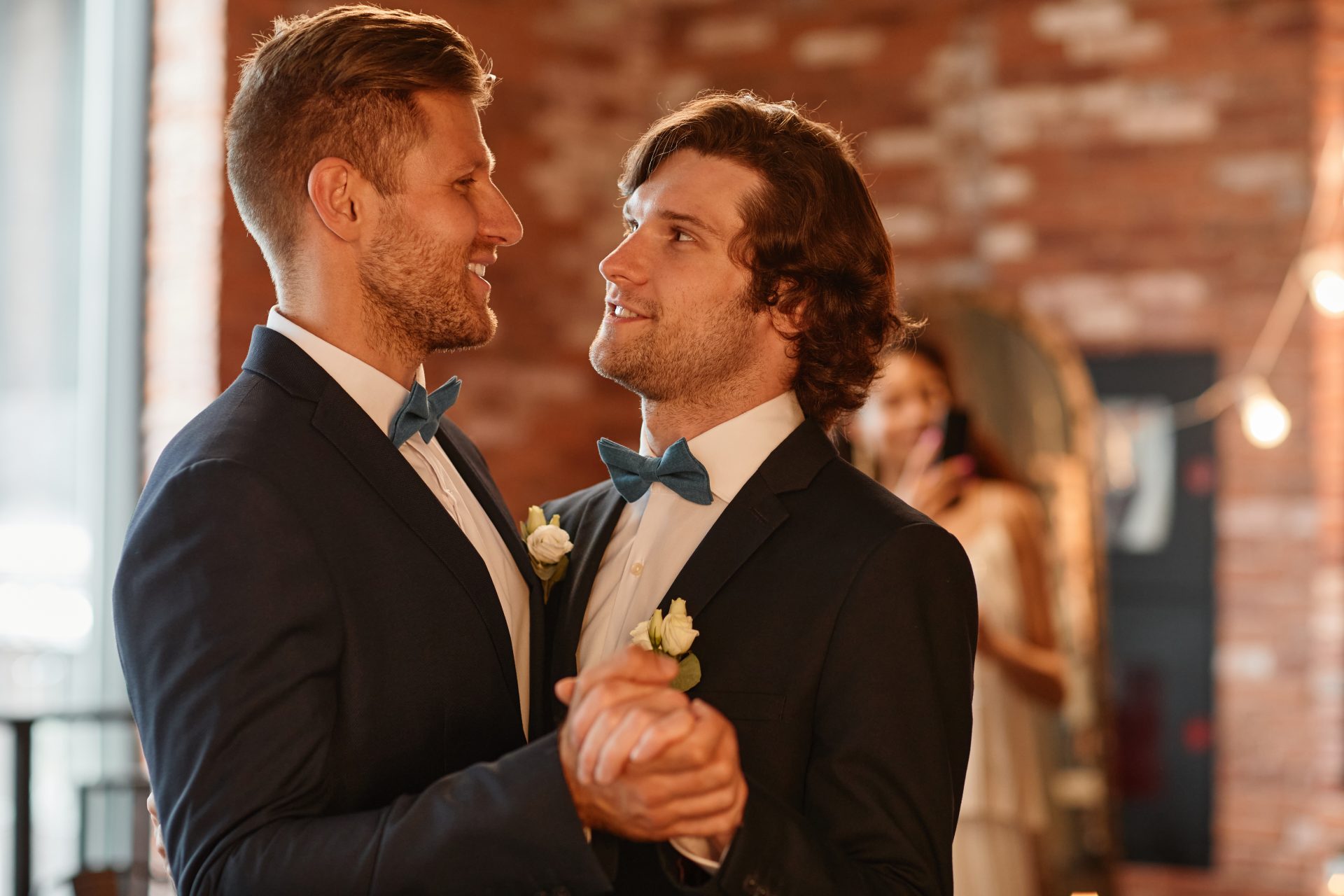 loving gay couple dancing in wedding side view 2023 11 27 05 17 57 utc