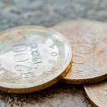 macro of three two hundred colombian peso coins 2023 11 27 05 19 14 utc