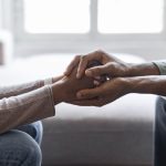 psychologist holding hands of woman patient provid 2023 11 27 05 01 50 utc