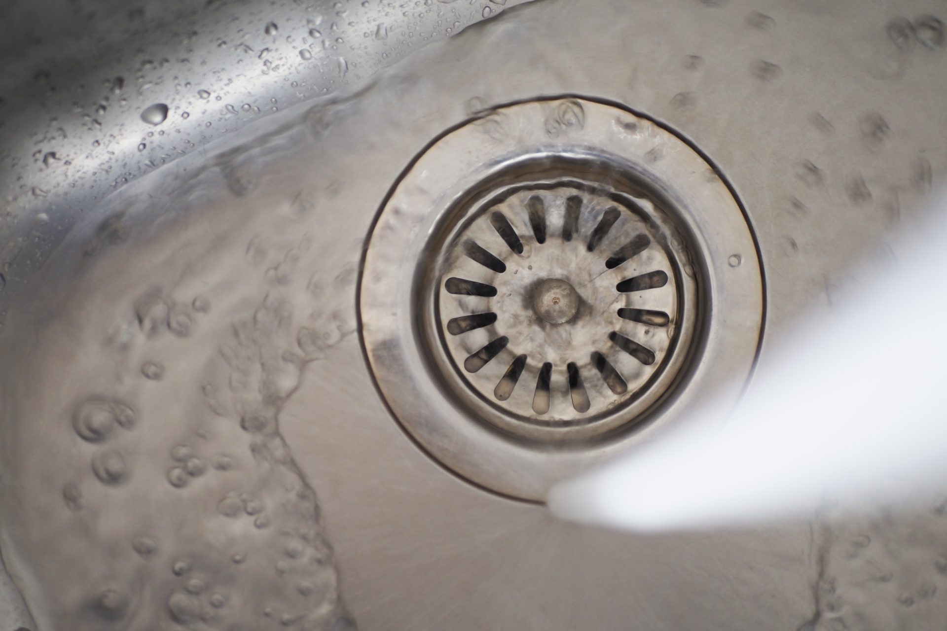 water pouring from a faucet tap slow motion 2023 11 27 05 25 31 utc