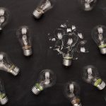 whole and broken light bulbs on black background 2023 11 27 05 10 14 utc