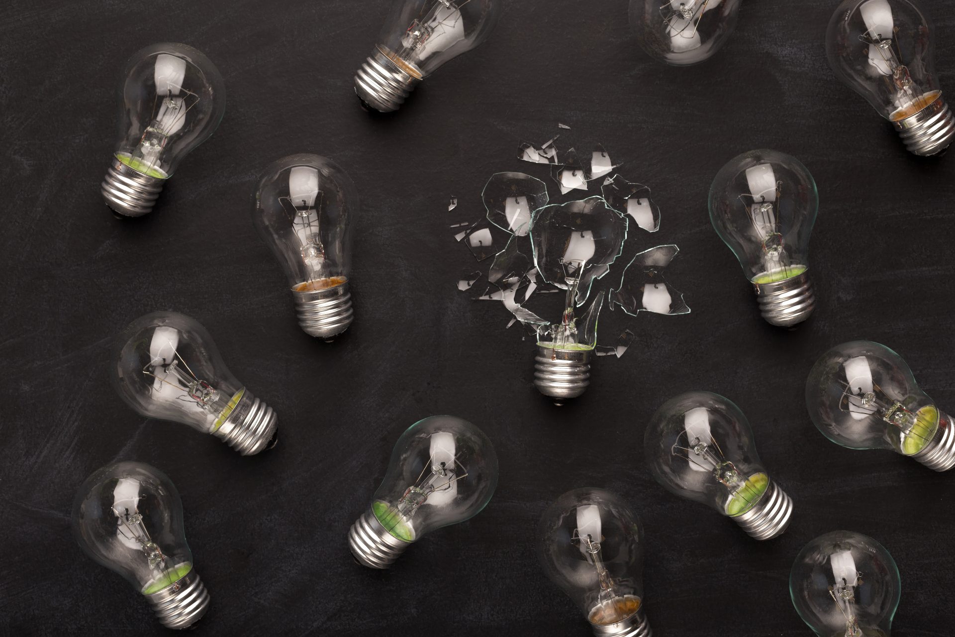 whole and broken light bulbs on black background 2023 11 27 05 10 14 utc