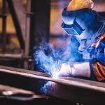 worker welding in a factory 2023 11 27 05 29 40 utc