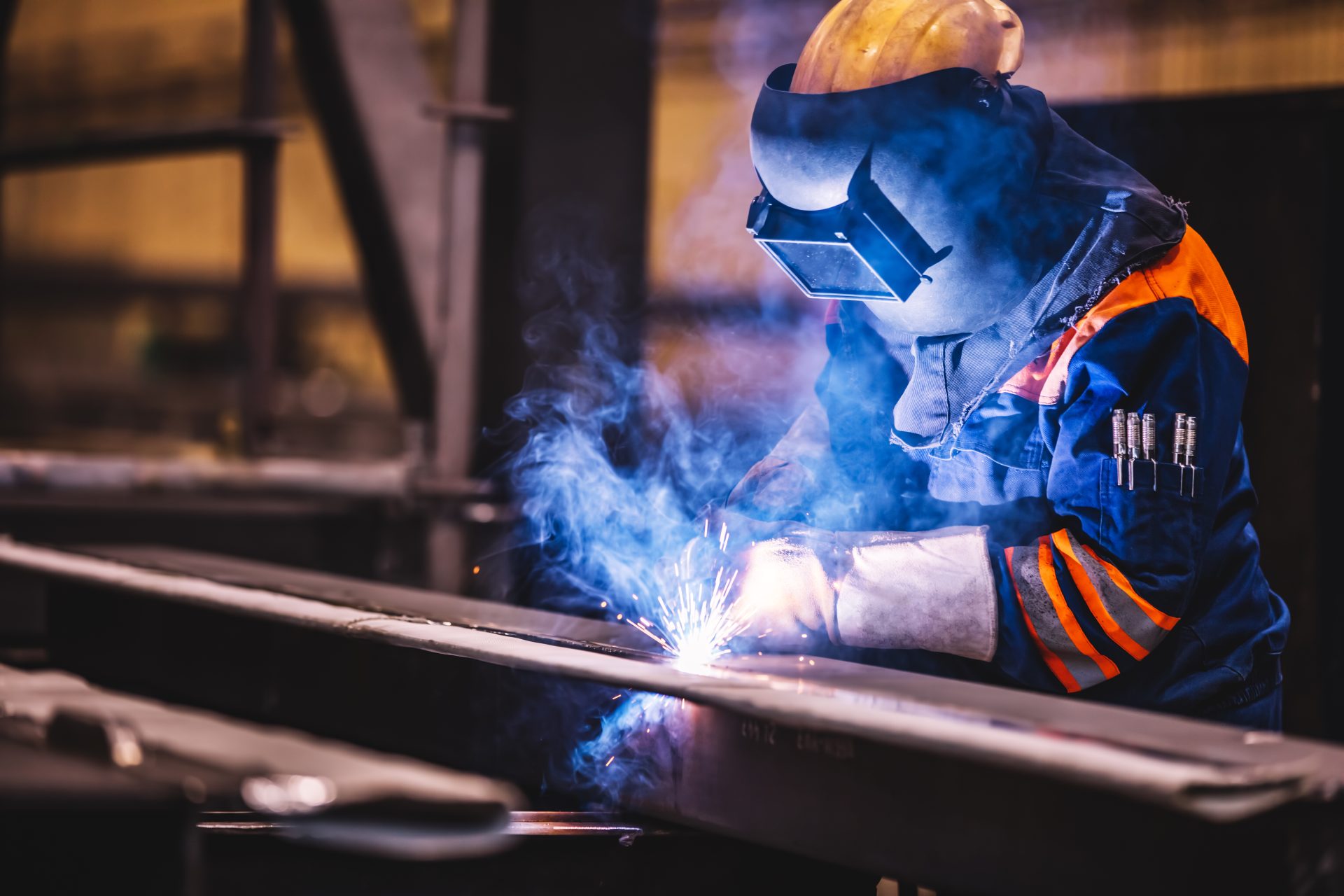 worker welding in a factory 2023 11 27 05 29 40 utc