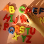 english alphabet kid playing alphabet letters 2023 11 27 05 31 29 utc