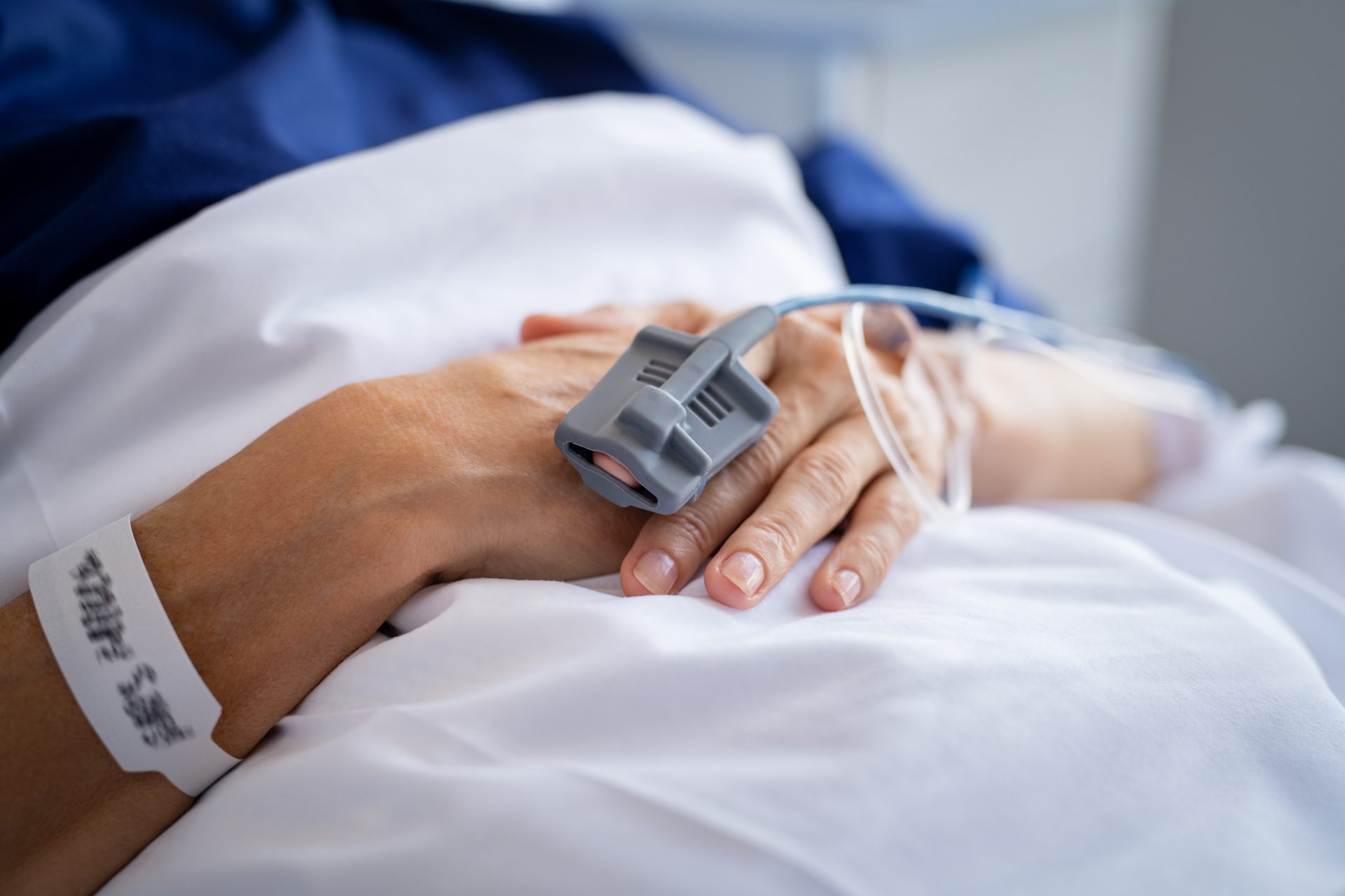 patient hands with iv drip in hospital 2023 11 27 05 26 43 utc
