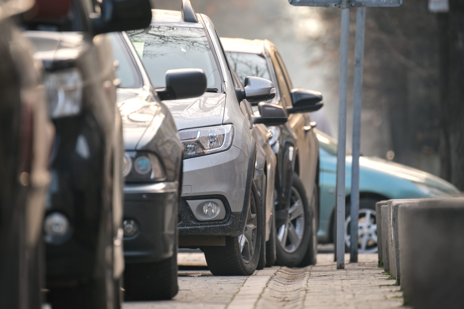 city traffic with cars parked in line on street si 2023 11 27 04 49 23 utc