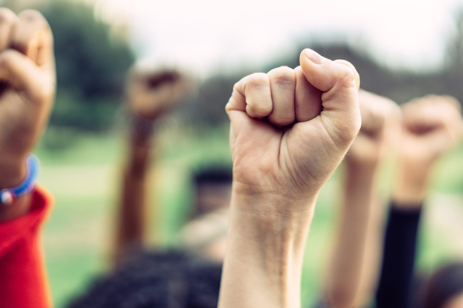 close up of a woman s clenched fist raised in prot 2023 11 27 04 53 09 utc