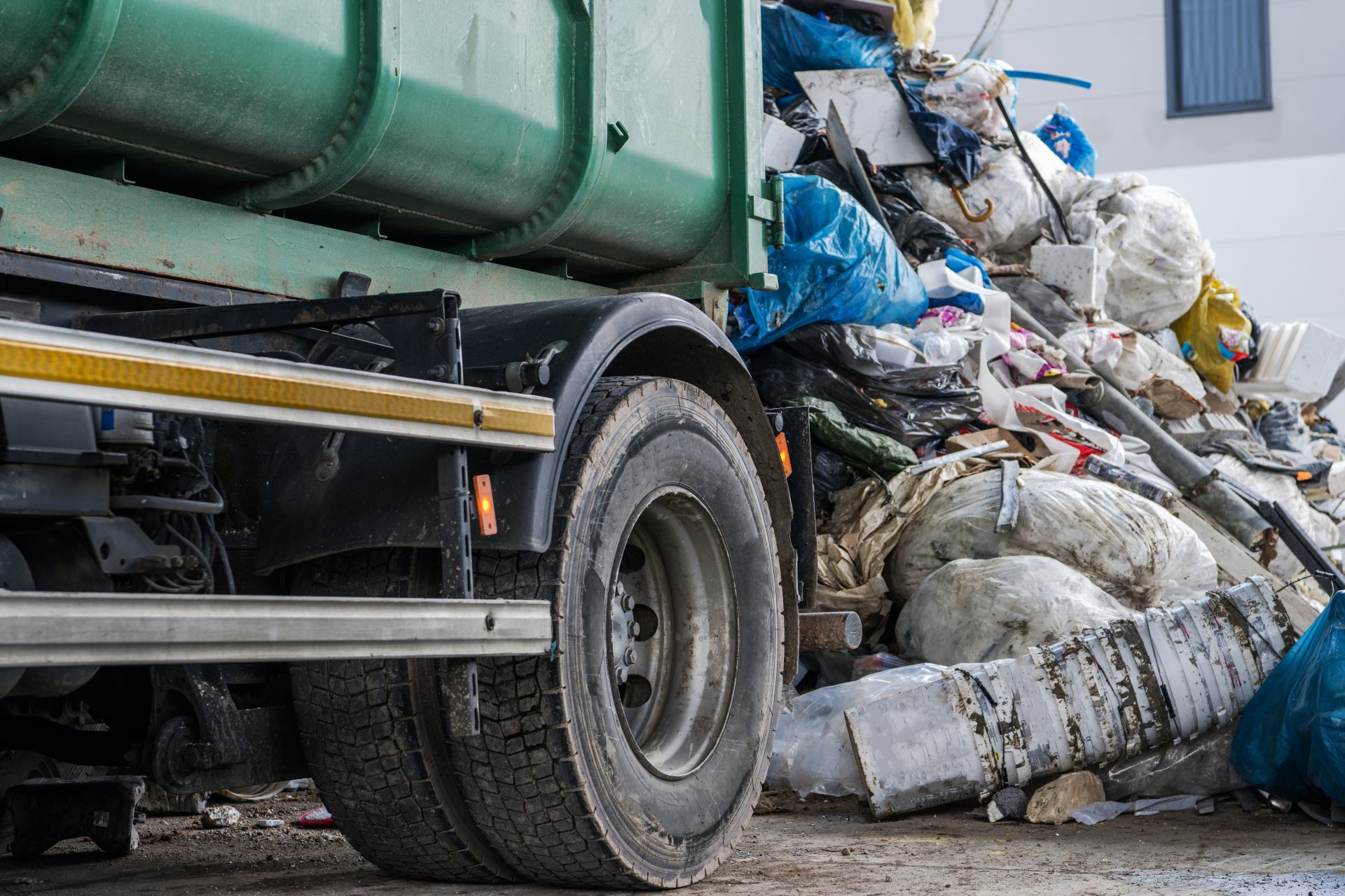 garbage truck and the pile of trash 2023 11 27 04 53 41 utc