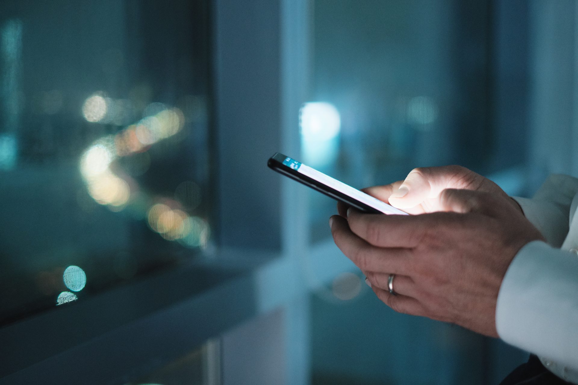 hands of business man typing text message on phone 2023 11 27 04 53 12 utc