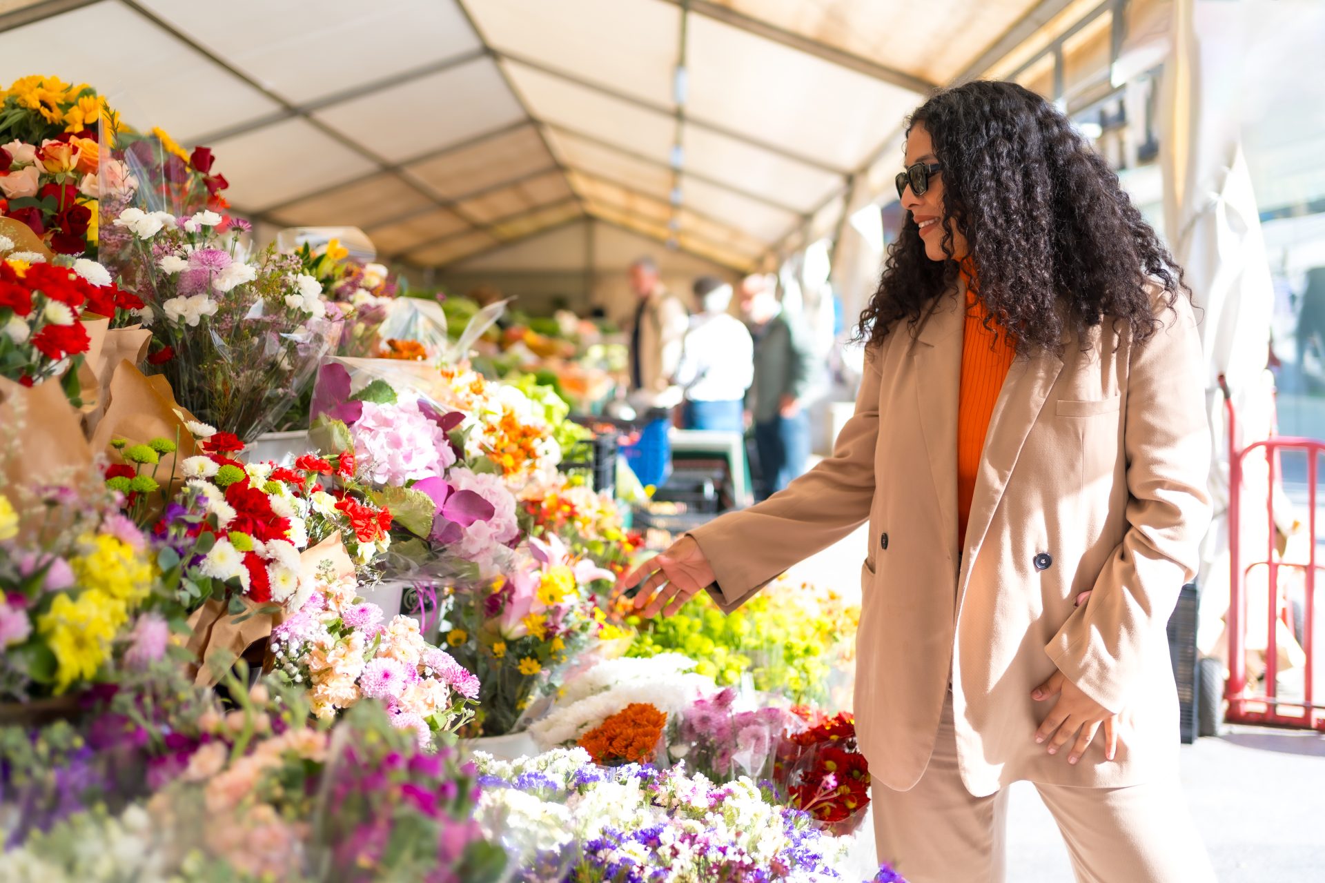 latin woman walking around a street market with fl 2023 11 27 05 16 02 utc