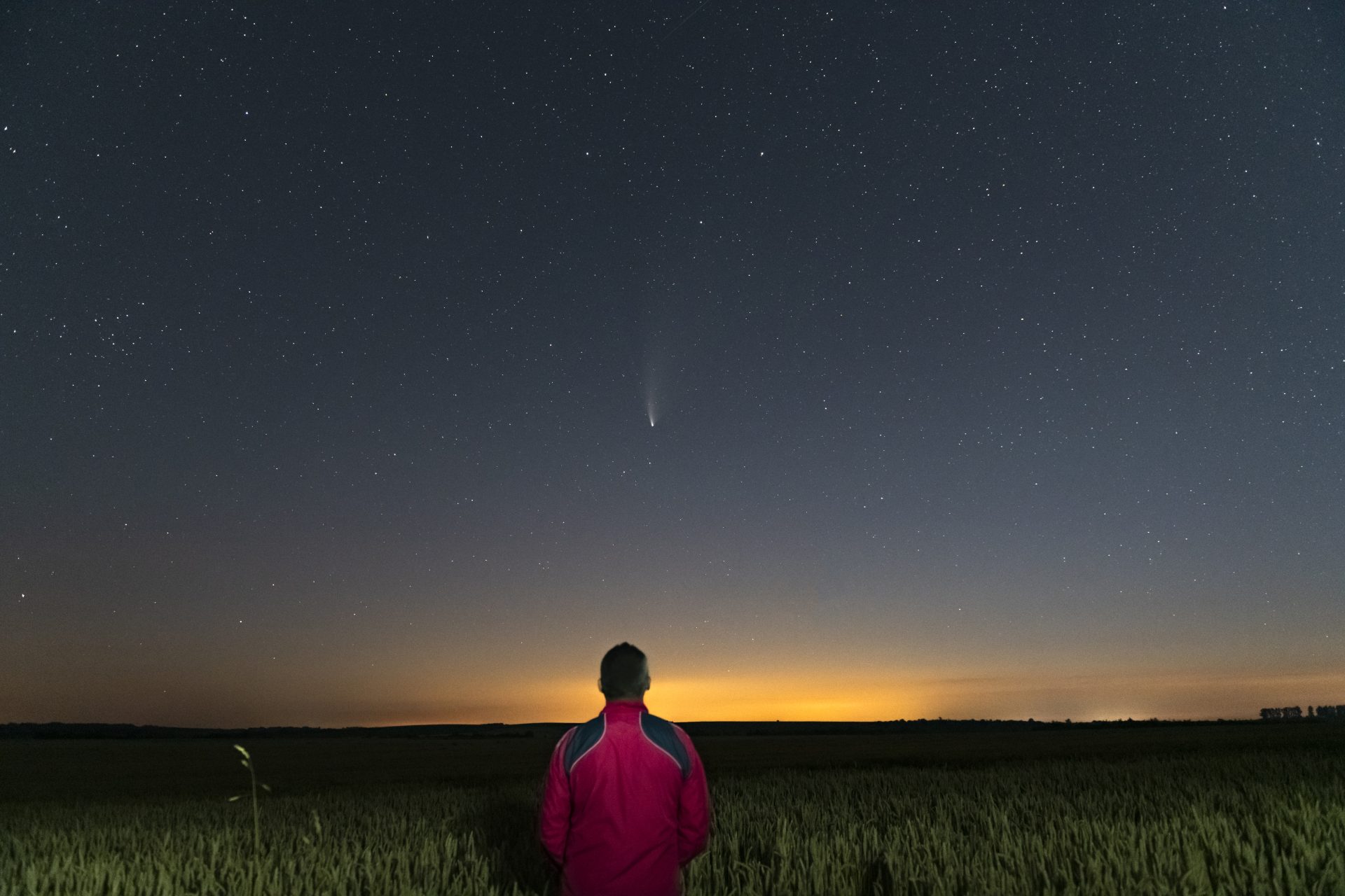silhouette of a man standing at night in a field o 2023 11 27 05 23 32 utc