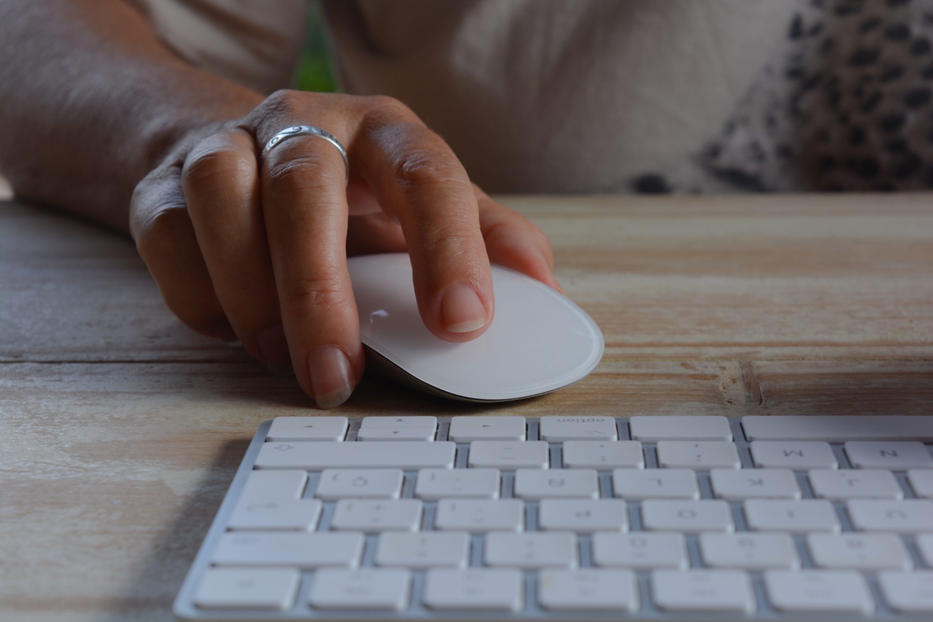 using technology hand on a computer mouse on desk 2023 11 27 05 25 14 utc