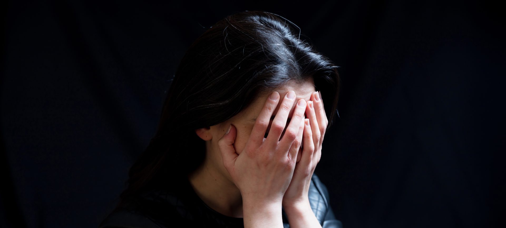 young woman cover eye sad and scarred in a dark r 2023 11 27 05 27 47 utc