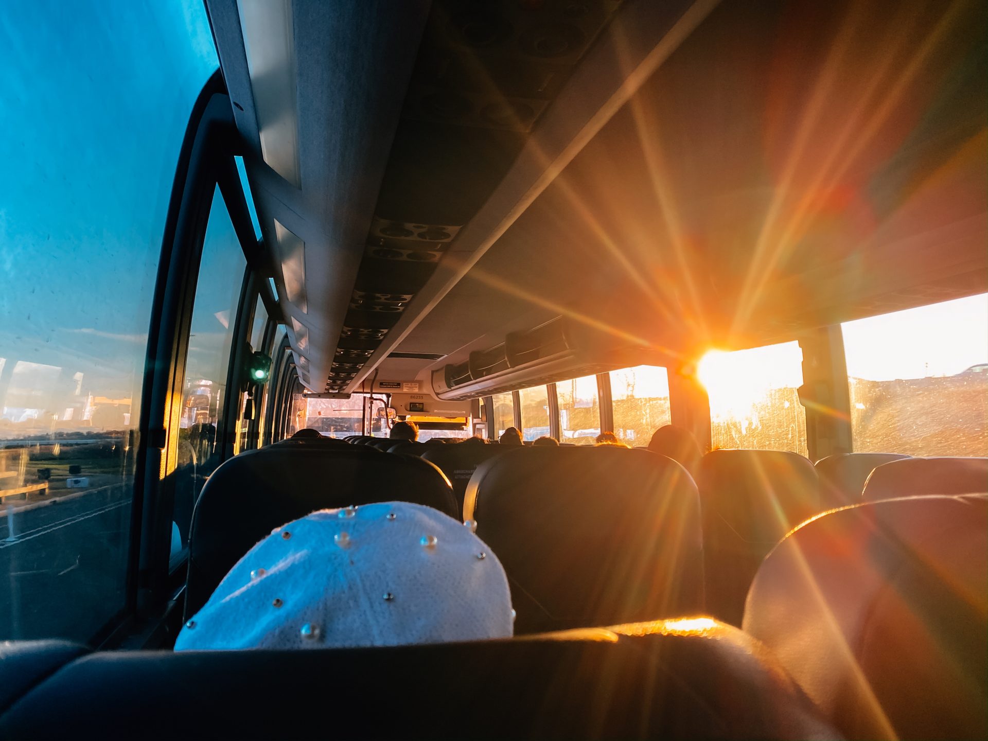bus trip passengers on a bus with sun shining thr 2023 11 27 05