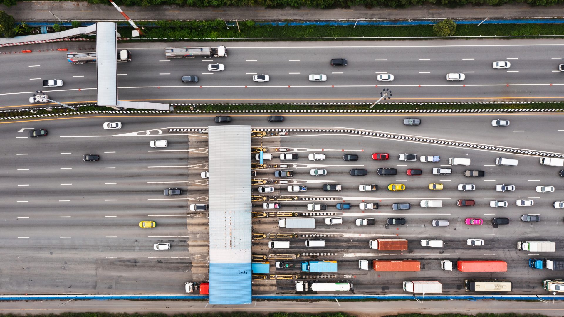 aerial view of a busy toll gate with vehicles lin 2024 09 09 19 41 38 utc