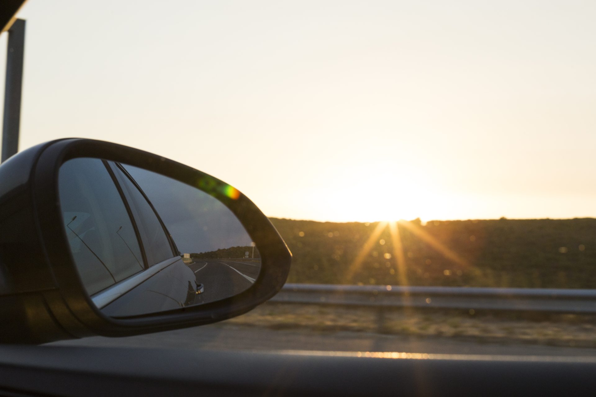 sunset view from the car in the rear mirror summe 2023 11 27 05 08 51 utc