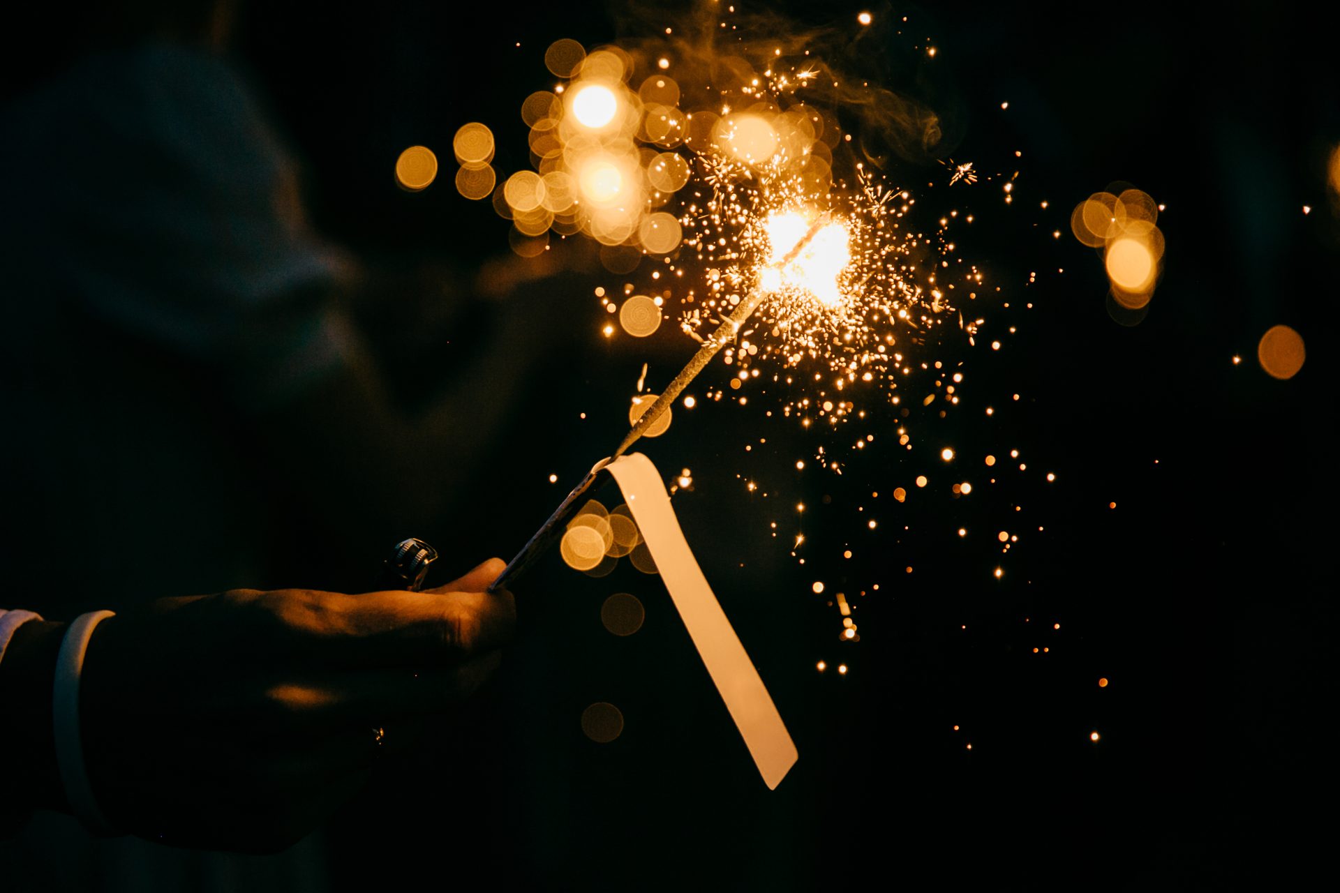 burning sparkle in darkness unrecognizable person 2023 11 27 05 23 18 utc