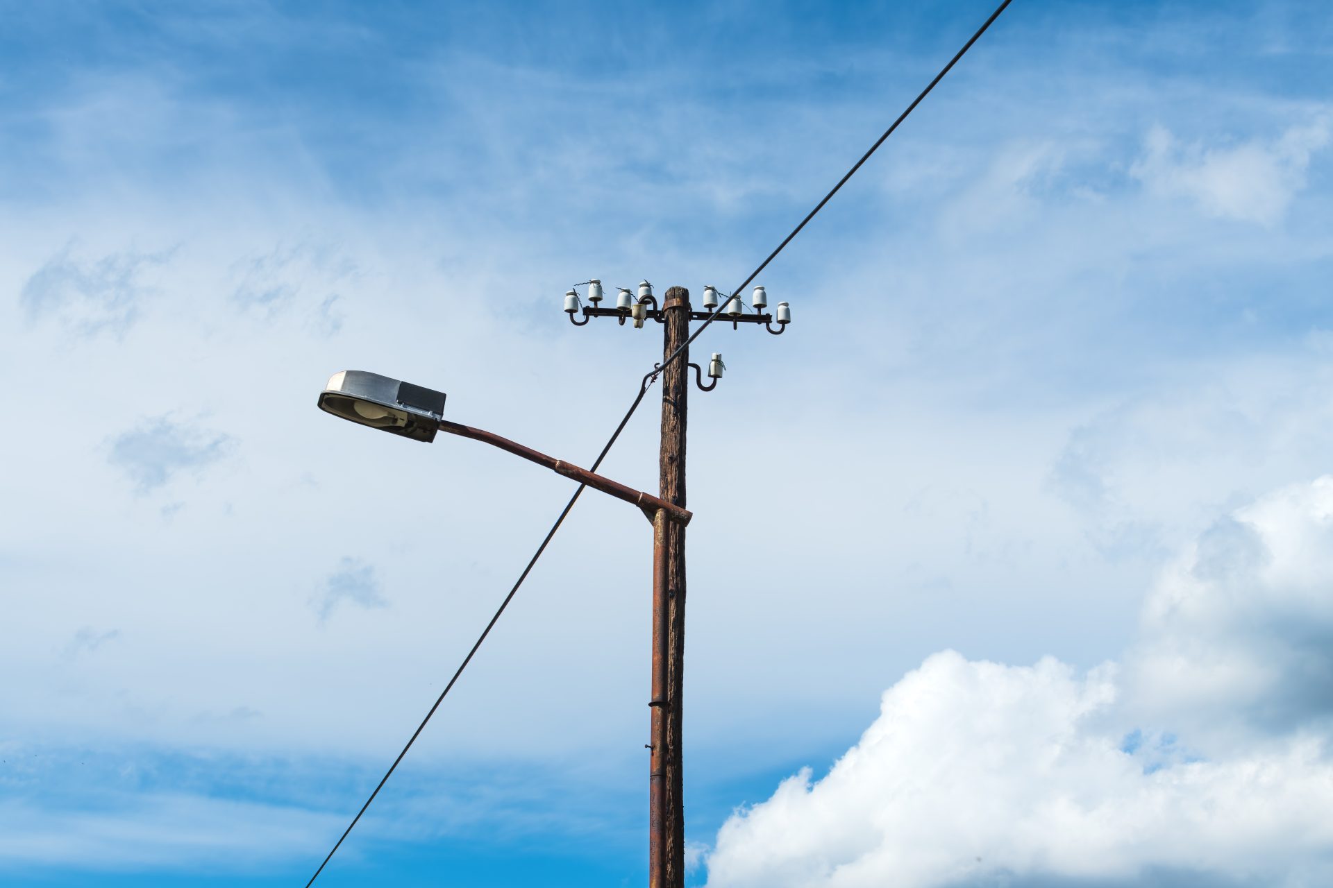 old street light lamp and electricity pole 2024 12 06 20 29 05 utc