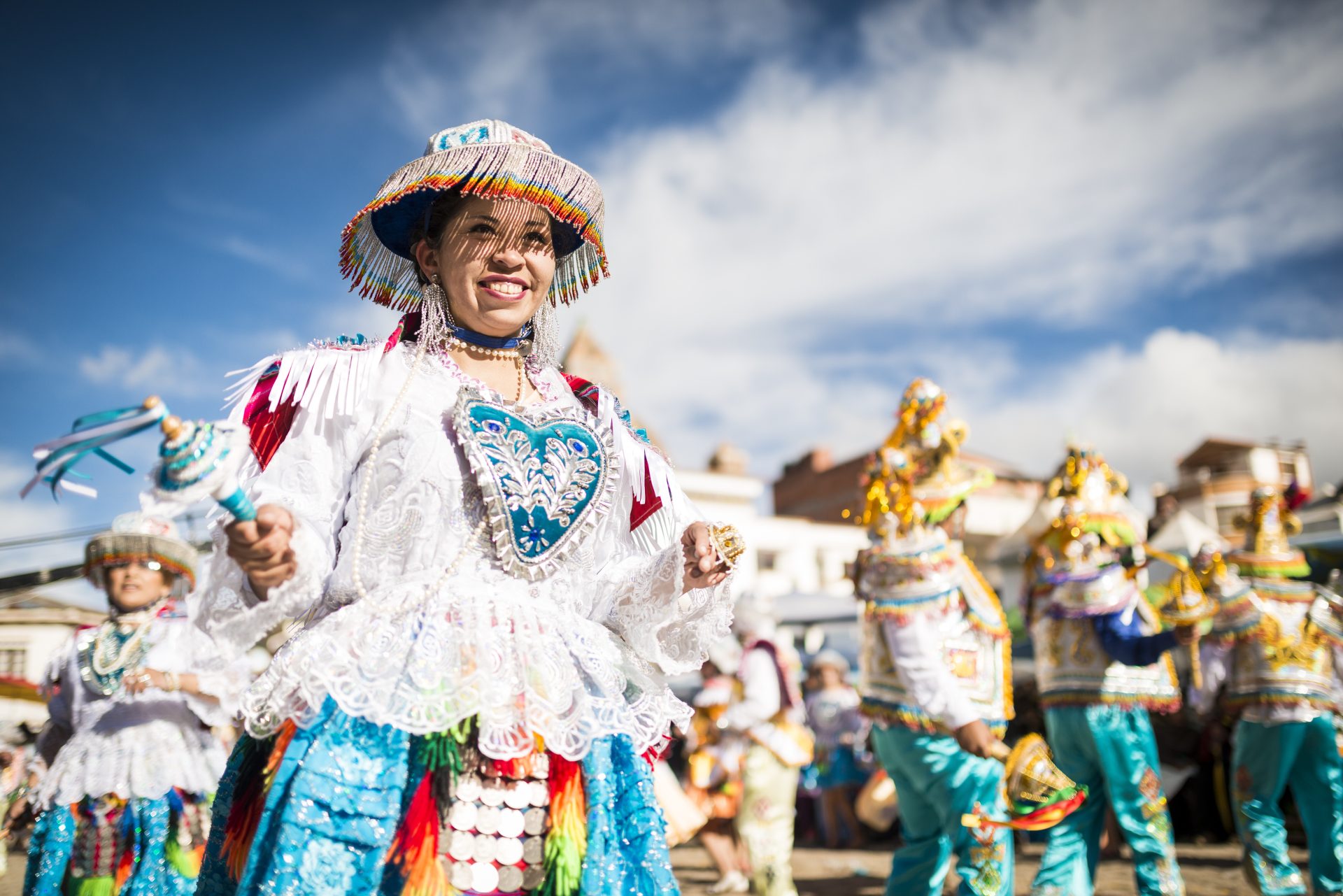 a jubilant dancer in traditional festive attire at 2024 07 08 21 22 32 utc