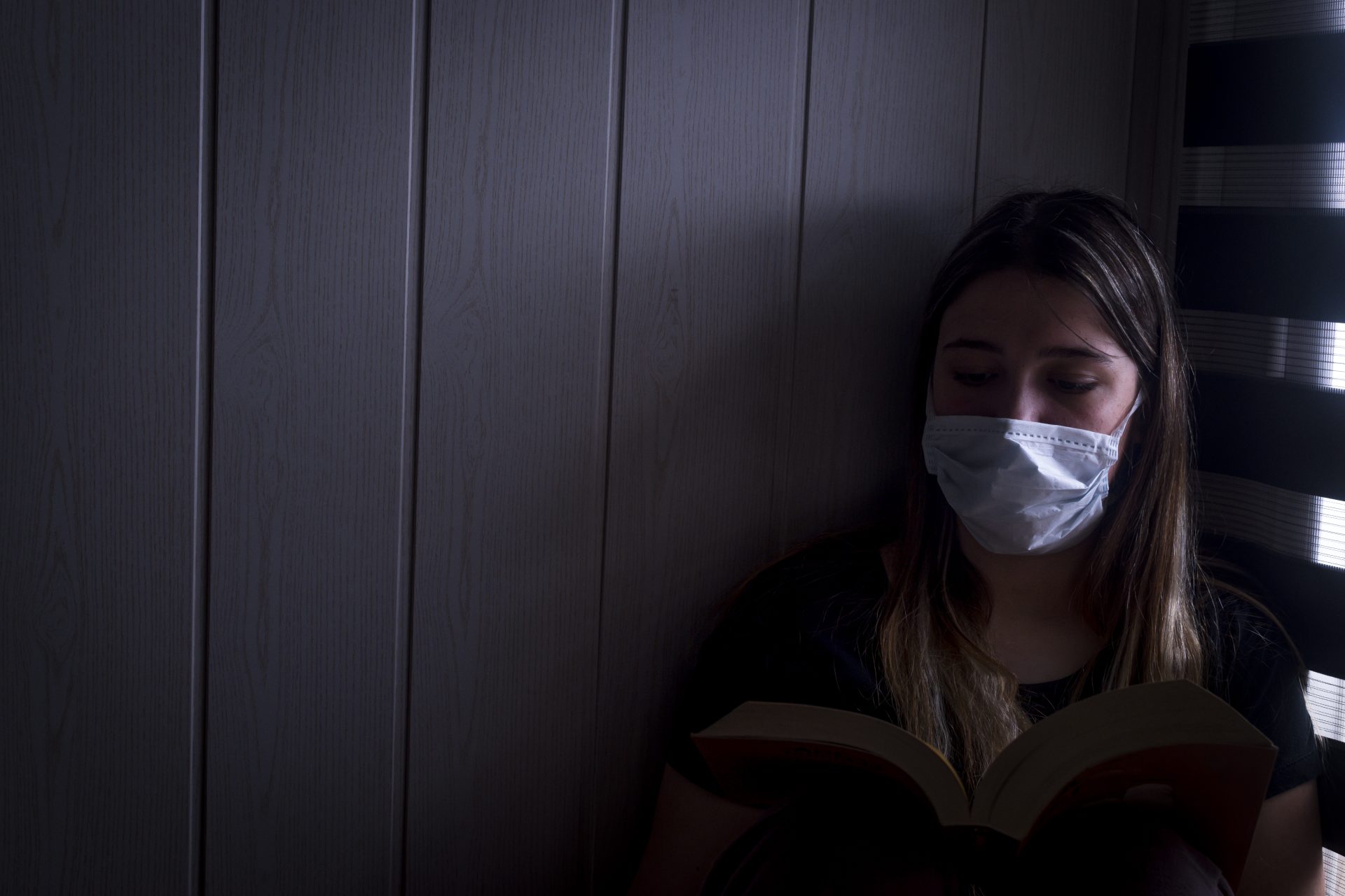 homebound teenager quarantined reading a book 2025 03 09 18 36 21 utc