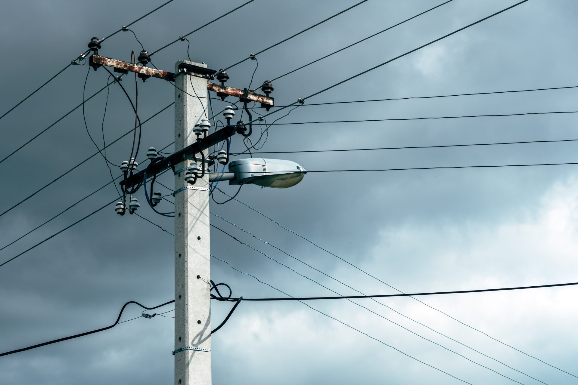 old power utility and street light pole with cable 2024 12 06 00 46 26 utc