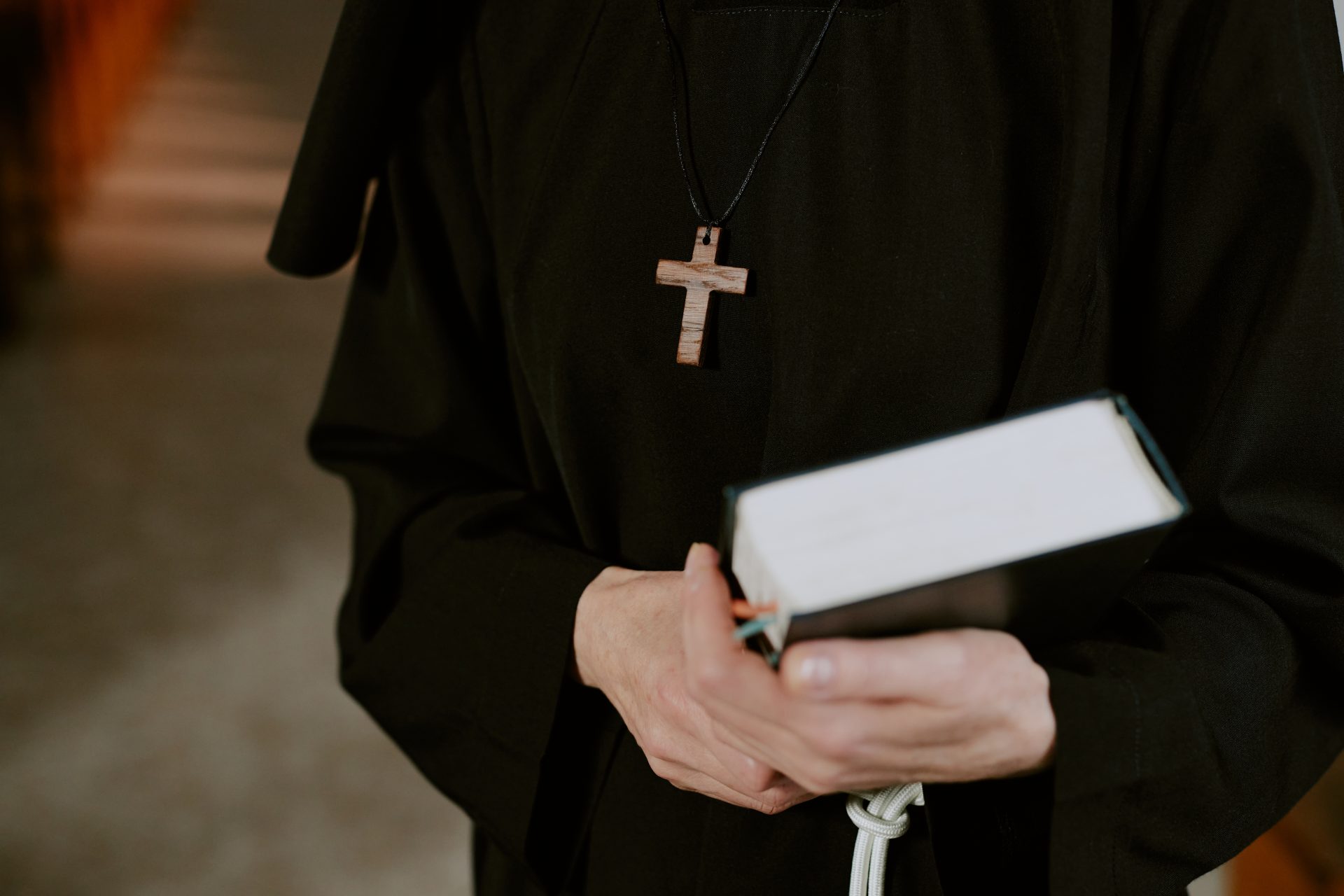 unrecognizable nun with bible book 2025 02 10 10 01 46 utc