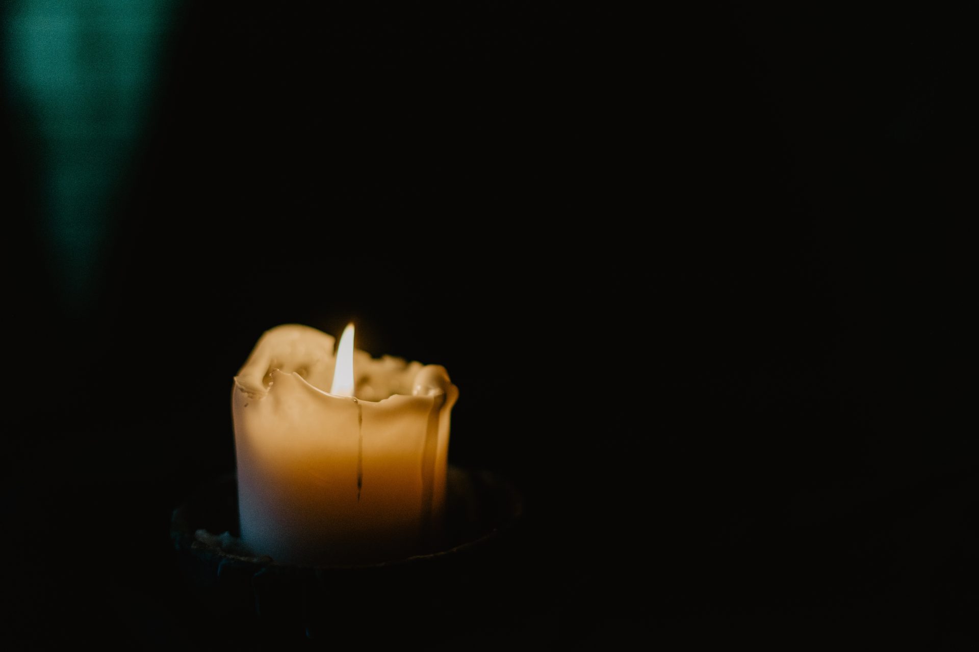 candle in the shadows religion grief 2025 01 09 18 07 34 utc