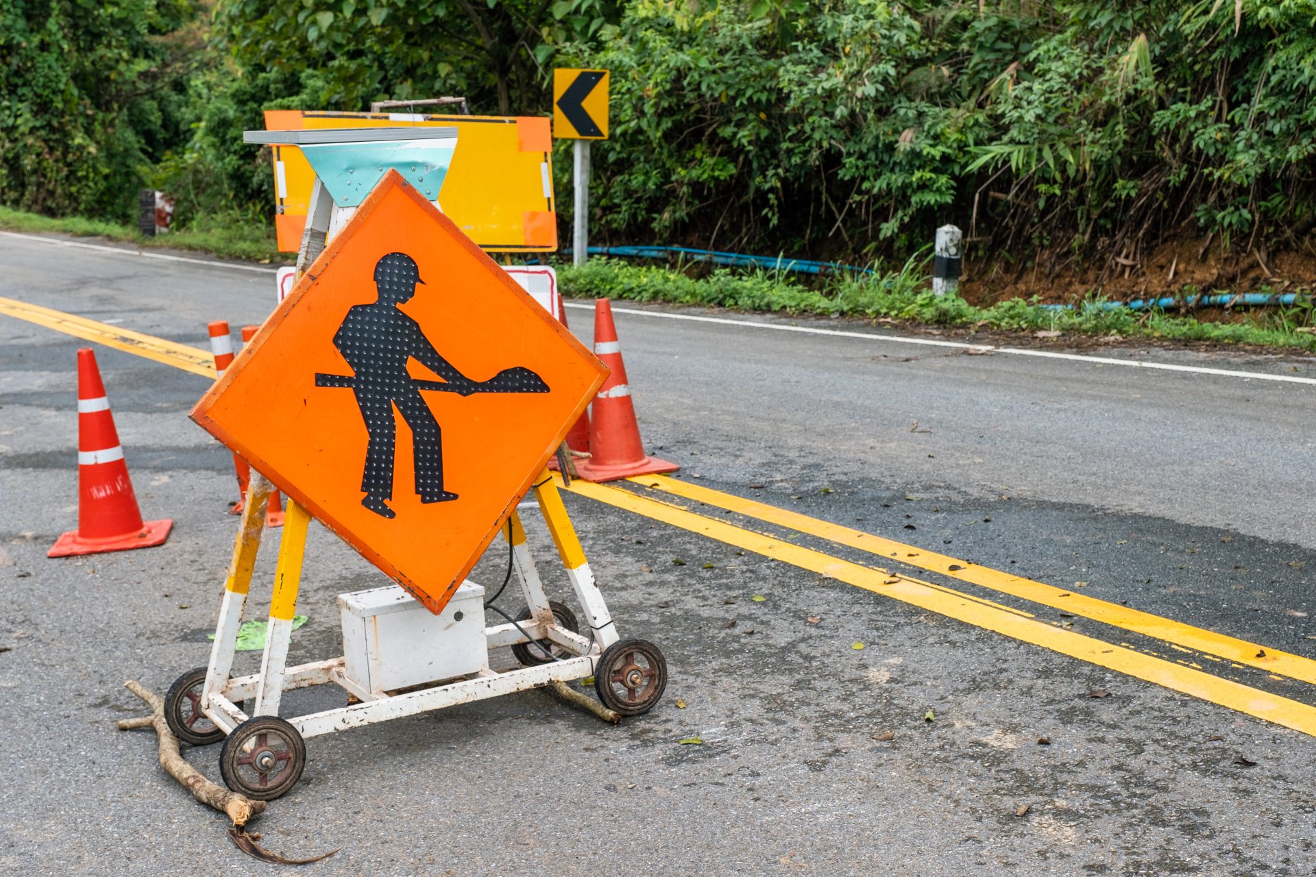 traffic signs on highway with landslide collapsed 2025 03 26 09 54 38 utc