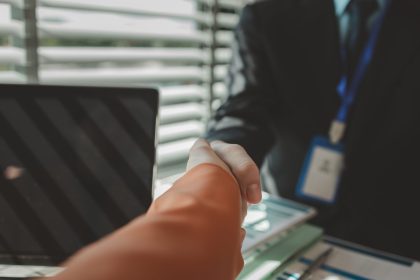 business partners shake hands after successfully s 2025 01 17 00 18 30 utc
