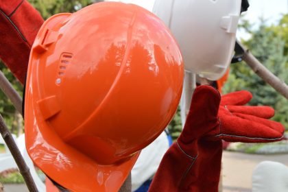 closeup of a red protective helmet and gloves out 2024 12 07 14 03 27 utc