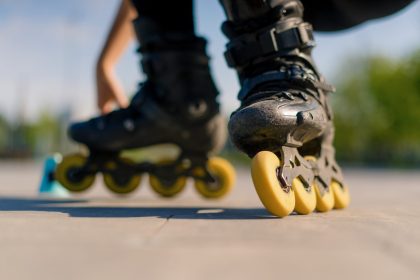 sporty girl practicing tricks on roller skates in 2024 12 05 08 05 35 utc