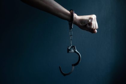 male hands in handcuffs black background 2025 01 10 02 23 35 utc
