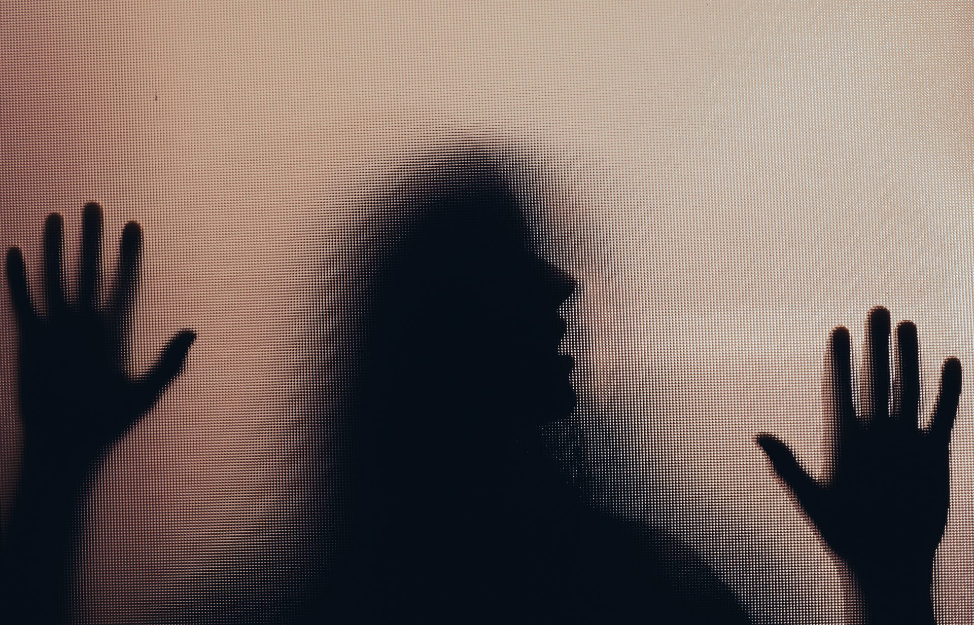 shadowy figure behind glass horror background 2025 03 24 18 28 22 utc