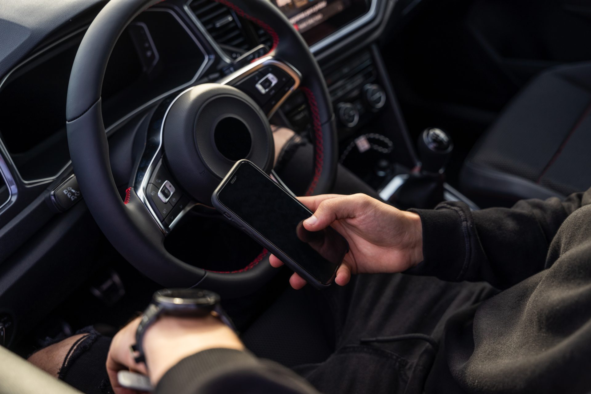 unrecognizable man using mobile phone in car 2024 12 06 22 02 59 utc