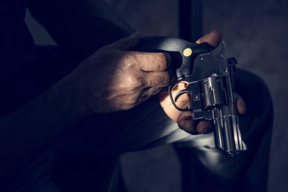 hands holding the gun 2025 02 10 12 18 46 utc