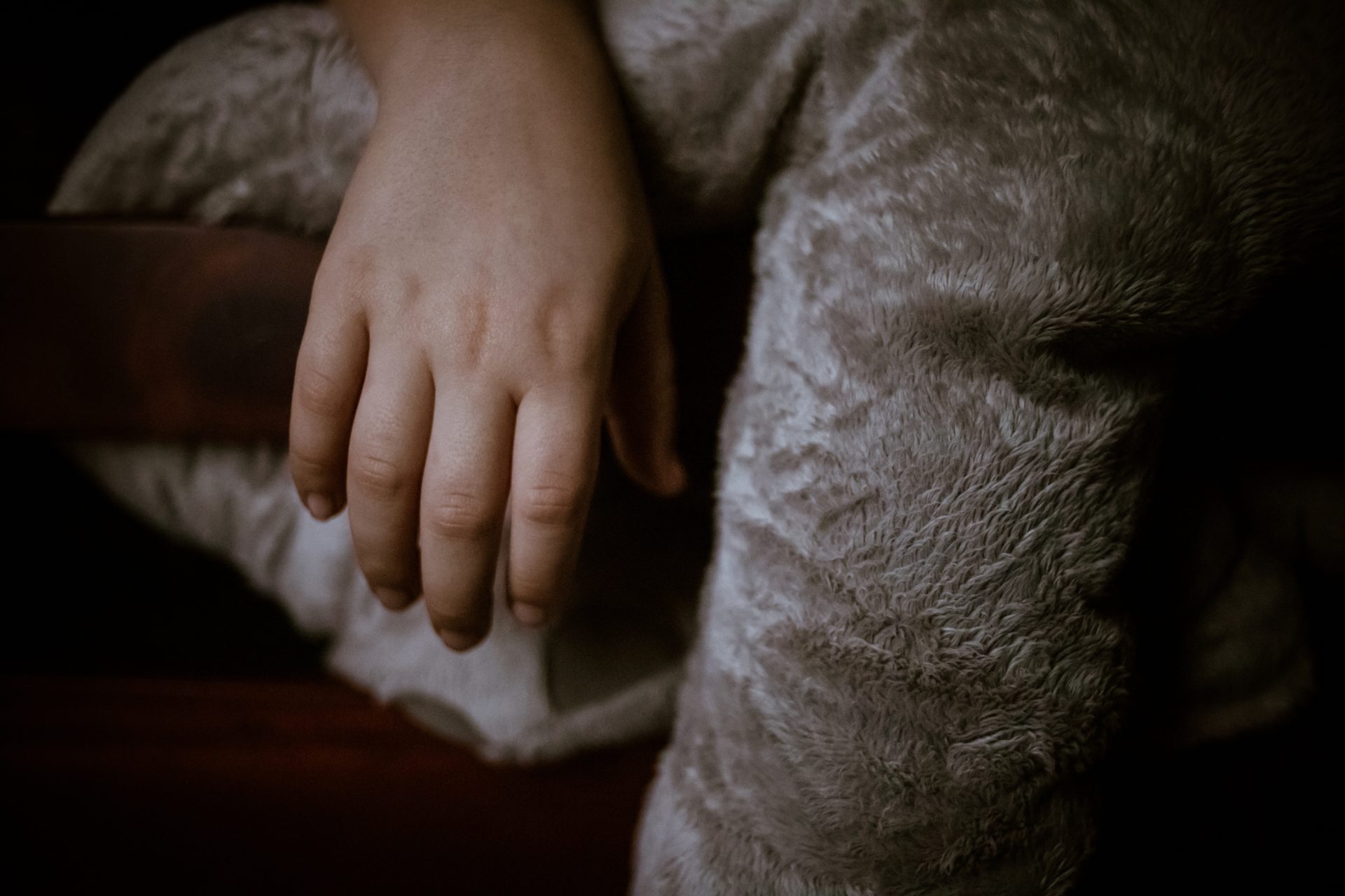little hand sticking out of bed while sleeping in 2025 01 08 22 37 17 utc